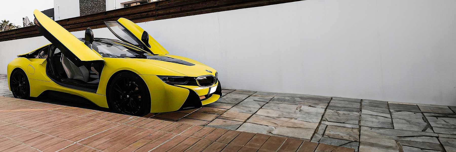 Banner image of a  BMW i8 I12 featuring original BMW wheels.