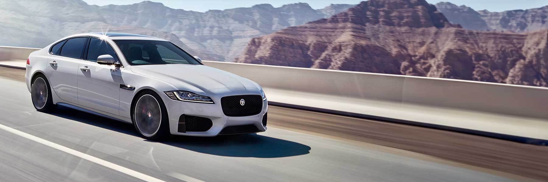 Banner image of a  Jaguar XF X260 featuring original Jaguar wheels.