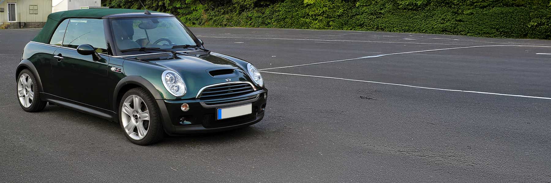 Banner image of a  MINI Cabriolet R52 featuring original MINI wheels.