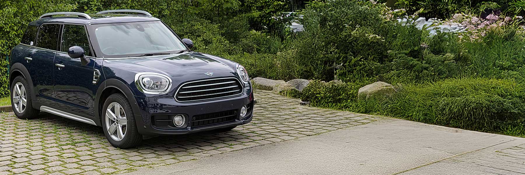 Banner image of a  MINI Countryman F60 featuring original MINI wheels.
