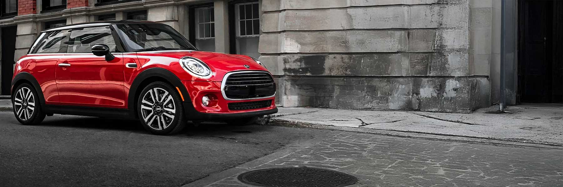 Banner image of a  MINI Hatchback F56 featuring original MINI wheels.