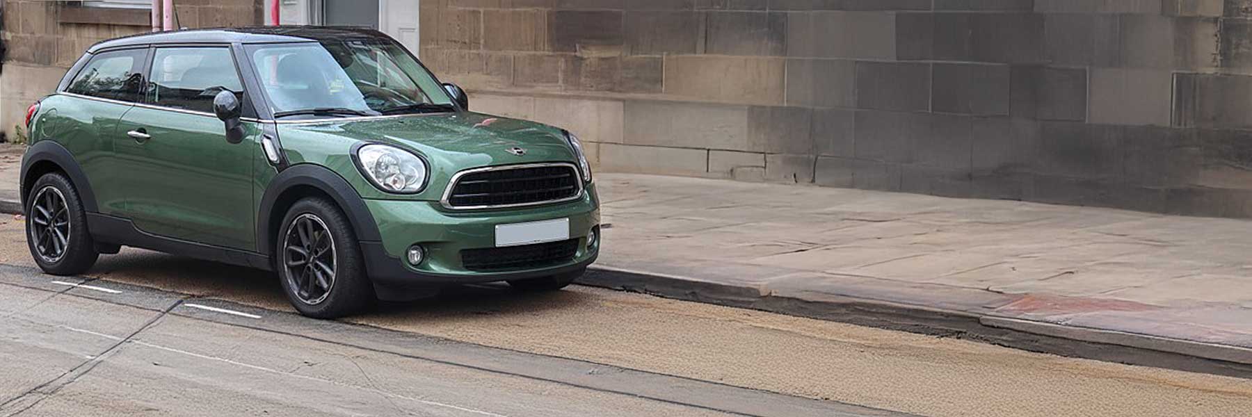 Banner image of a  MINI Paceman R61 featuring original MINI wheels.