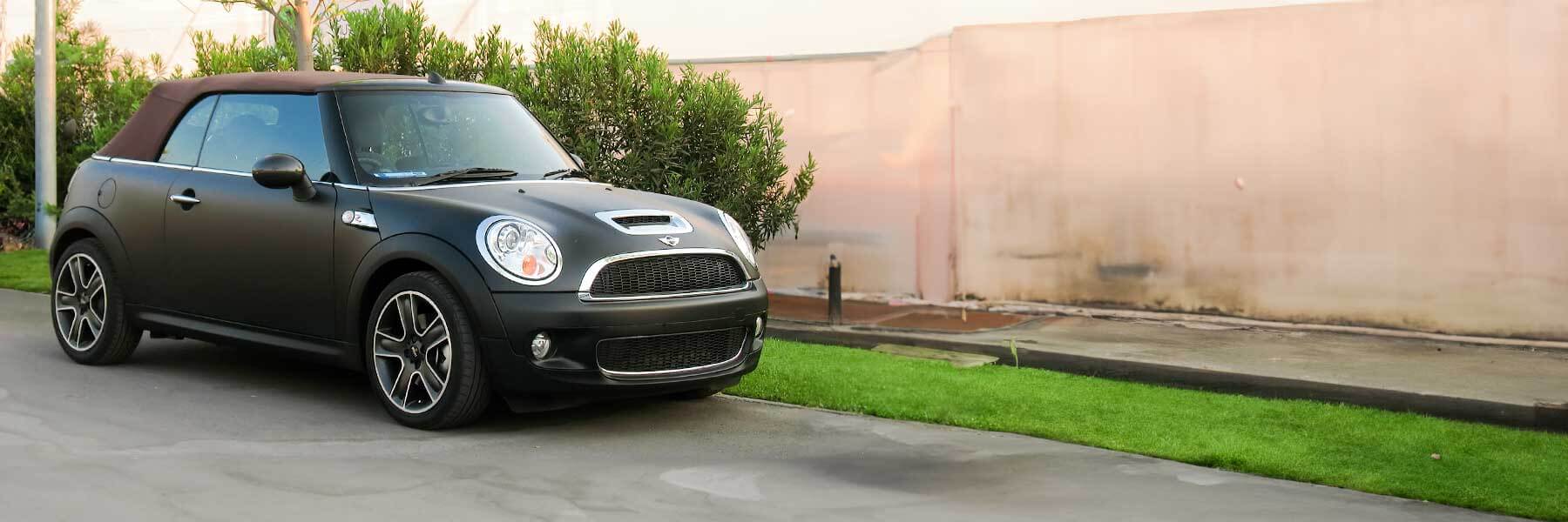 Banner image of a  MINI Cabriolet R57 featuring original MINI wheels.