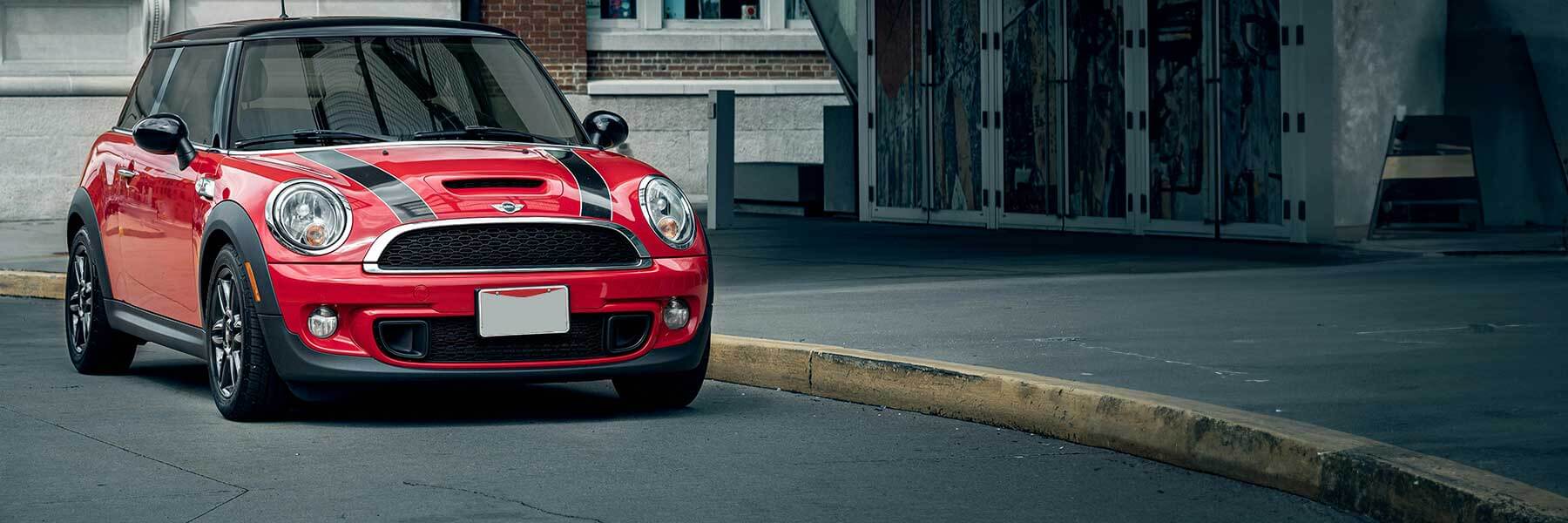 Banner image of a  MINI Hatchback R56 featuring original MINI wheels.