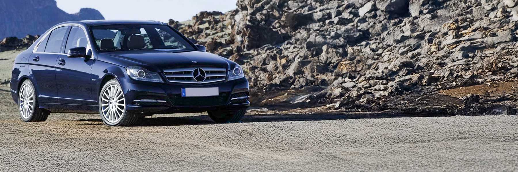 Banner image of a  Mercedes C-Class C204 featuring original Mercedes wheels.