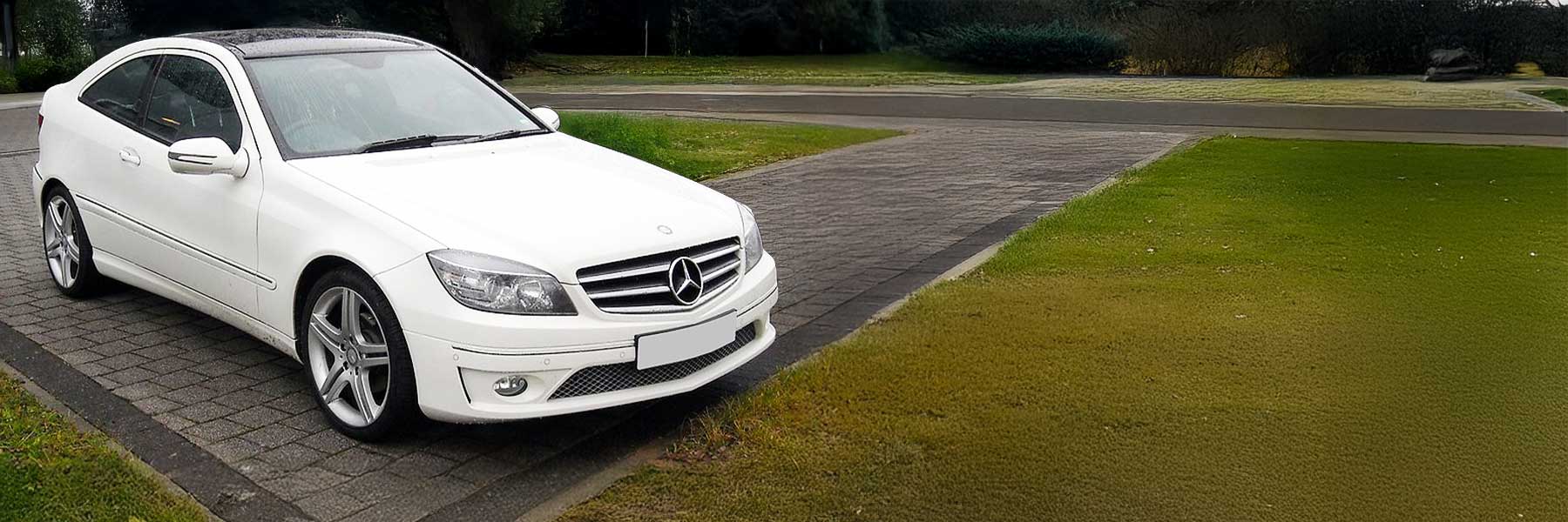 Banner image of a  Mercedes CLC C203 featuring original Mercedes wheels.