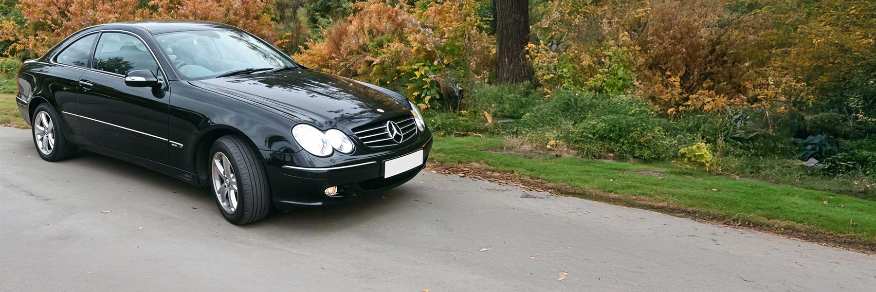 Banner image of a  Mercedes CLK C209 featuring original Mercedes wheels.