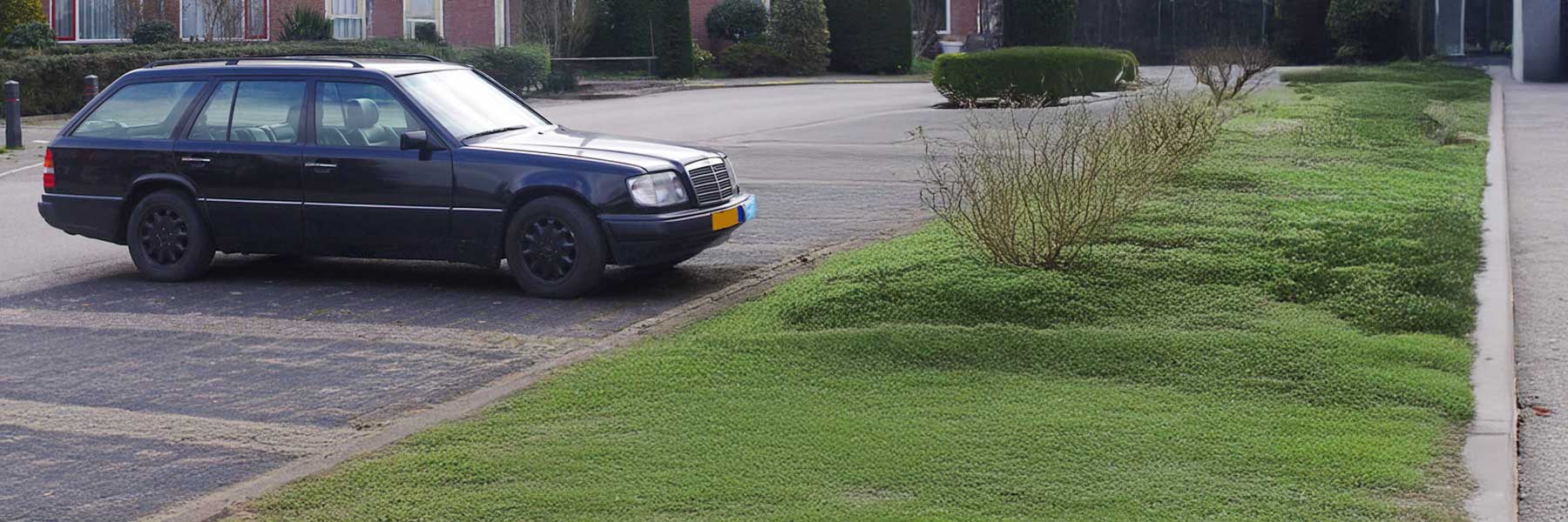 Banner image of a  Mercedes E-Class S124 featuring original Mercedes wheels.