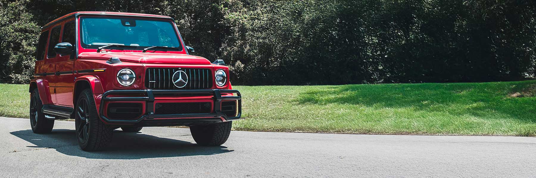 Banner image of a  Mercedes G-Class W463A featuring original Mercedes wheels.