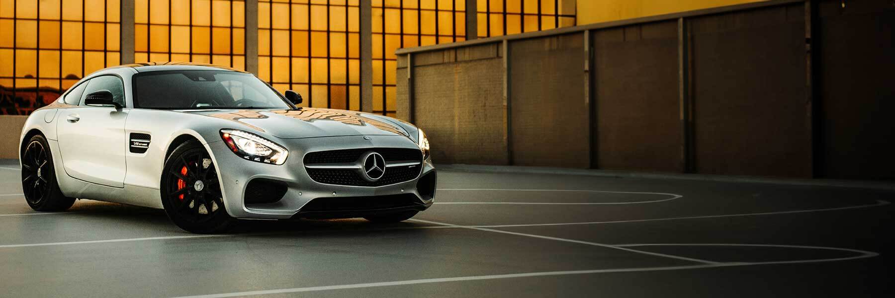 Banner image of a  Mercedes AMG GT C190 featuring original Mercedes wheels.