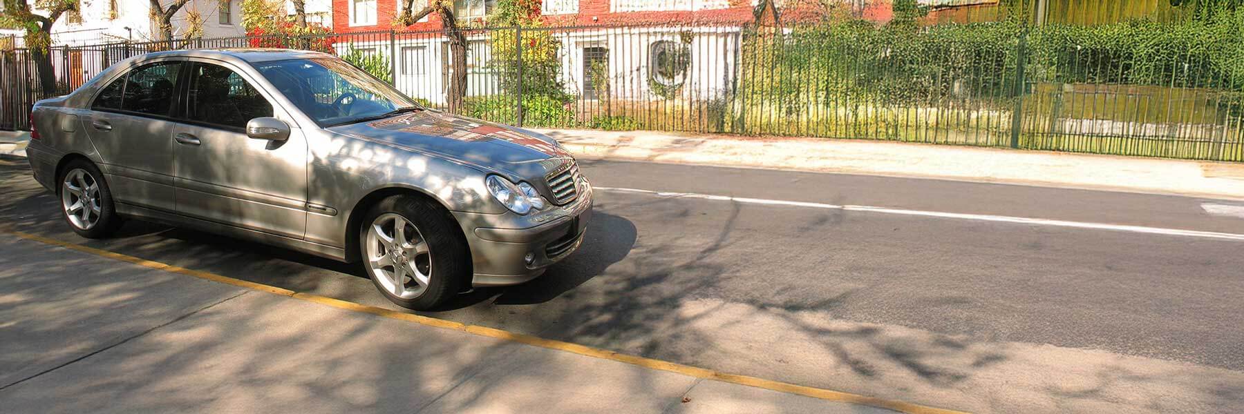 Banner image of a  Mercedes C-Class C203 featuring original Mercedes wheels.