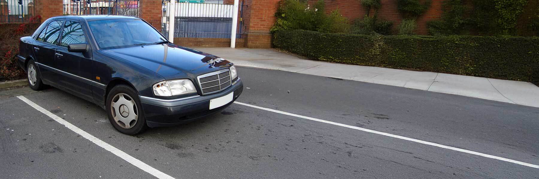 Banner image of a  Mercedes C-Class S202 featuring original Mercedes wheels.