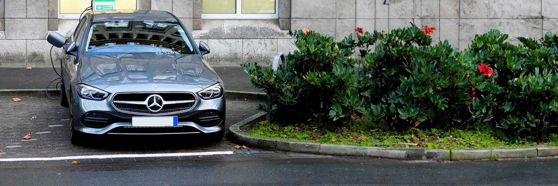 Banner image of a  Mercedes C-Class W206 featuring original Mercedes wheels.