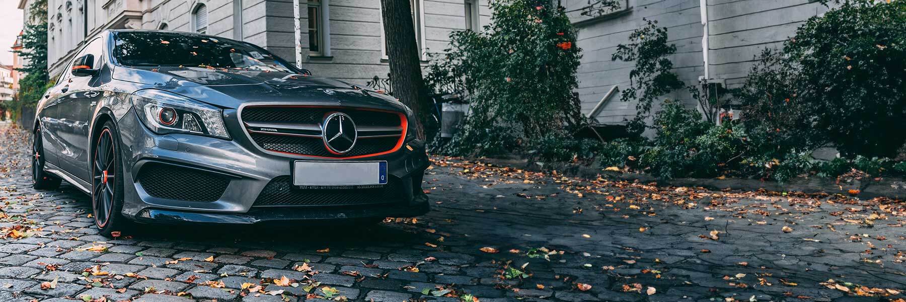 Banner image of a  Mercedes CLA X117 featuring original Mercedes wheels.
