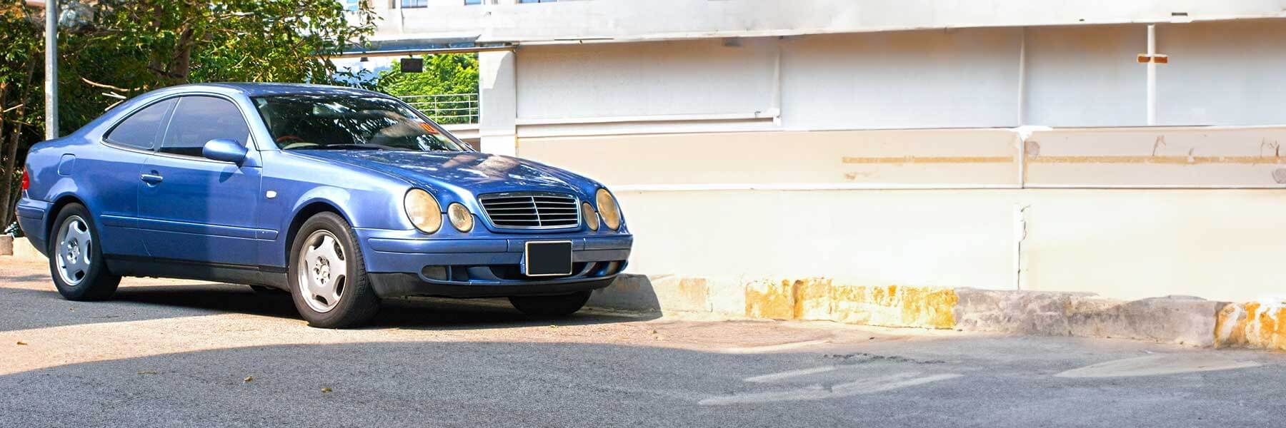 Banner image of a  Mercedes CLK C208 featuring original Mercedes wheels.