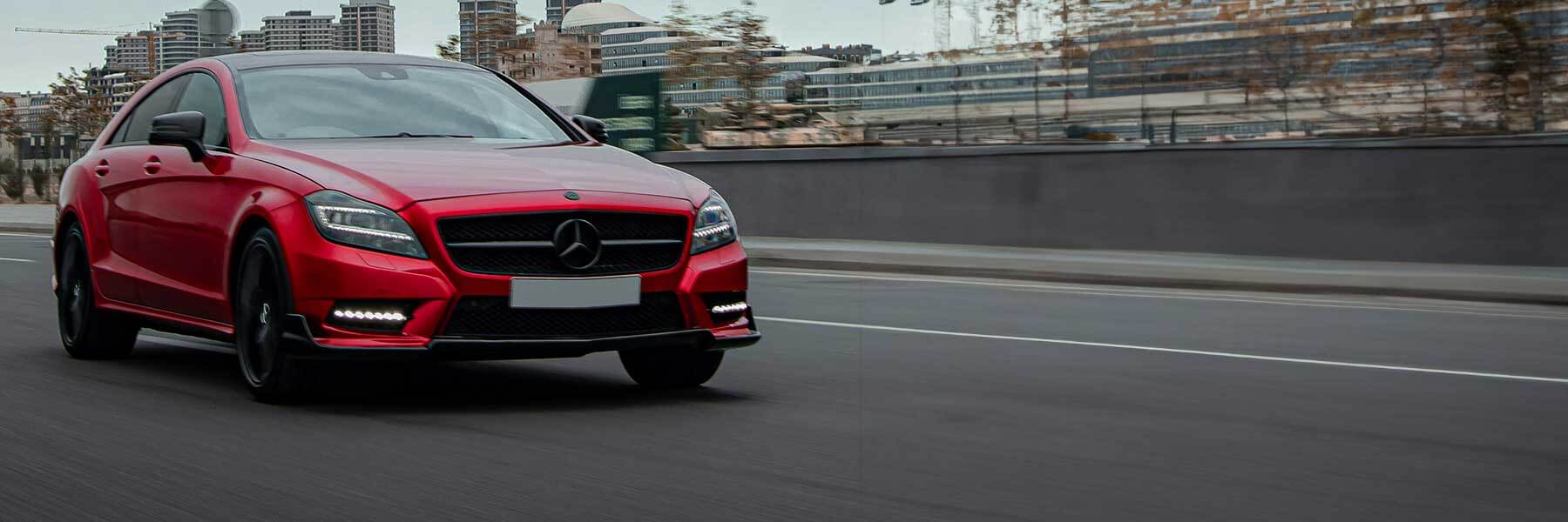 Banner image of a  Mercedes CLS X218 featuring original Mercedes wheels.