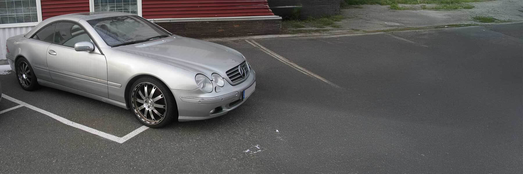 Banner image of a  Mercedes CL C215 featuring original Mercedes wheels.