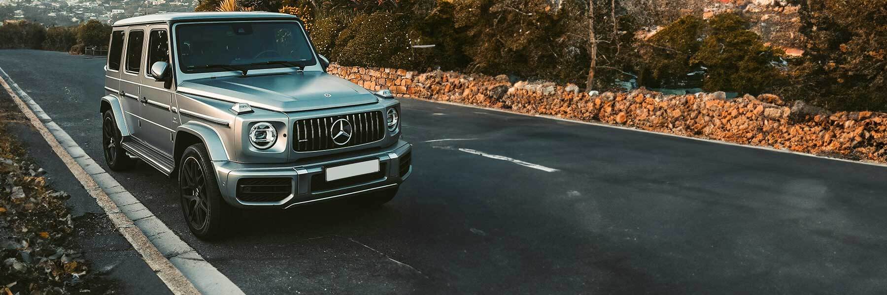 Banner image of a  Mercedes G-Class G460 featuring original Mercedes wheels.