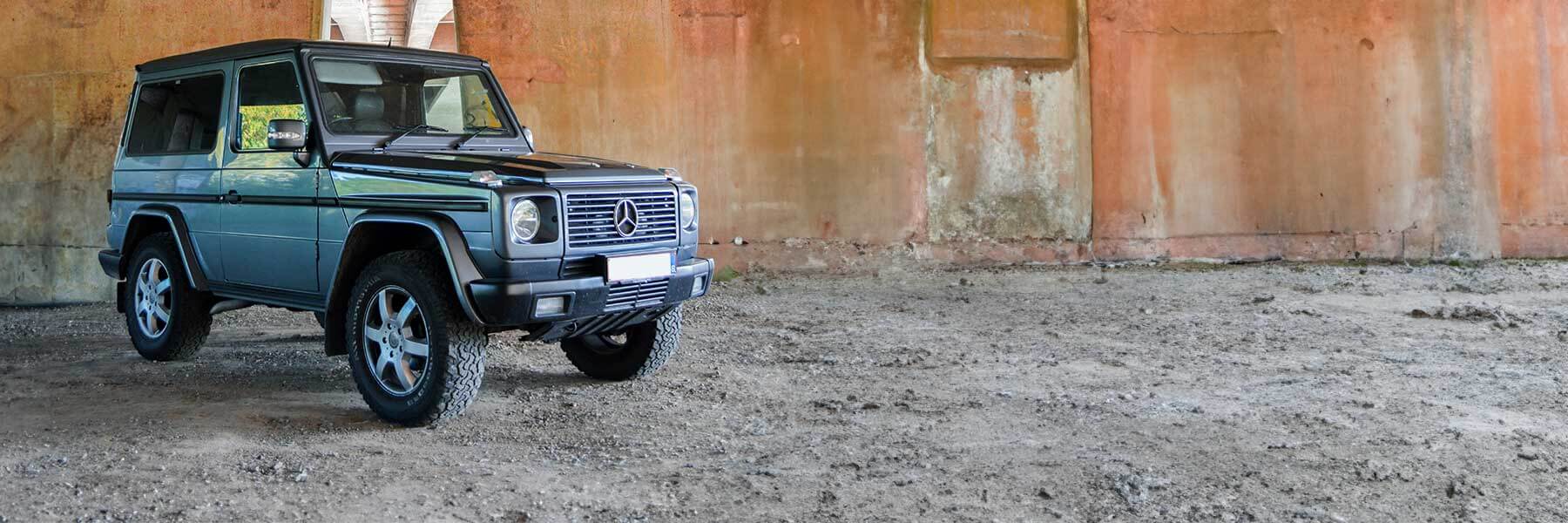 Banner image of a  Mercedes G-Class G463 featuring original Mercedes wheels.