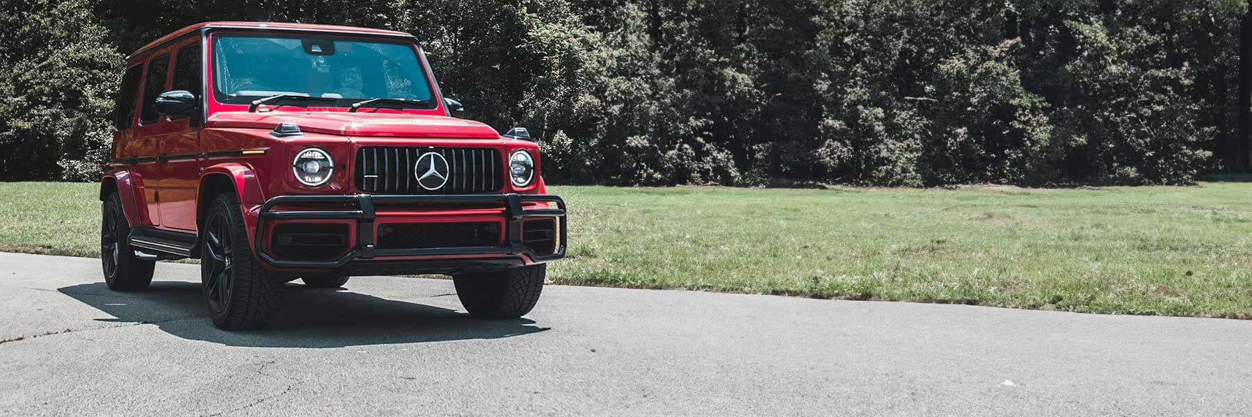 Banner image of a  Mercedes G-Class W465 featuring original Mercedes wheels.