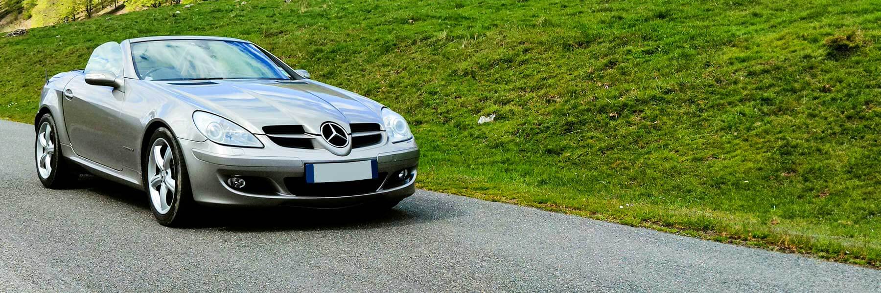Banner image of a  Mercedes SLK R171 featuring original Mercedes wheels.