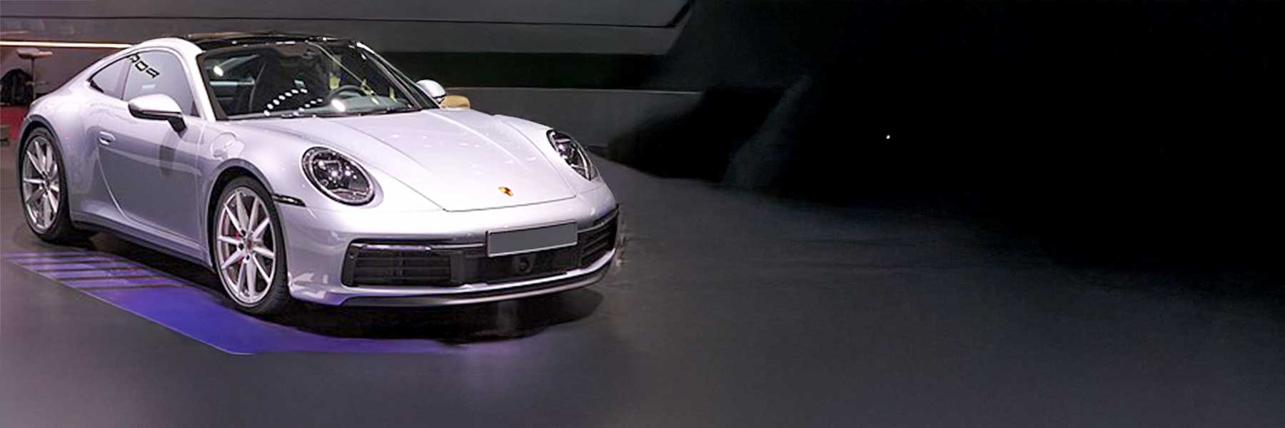Banner image of a  Porsche 992 (911) 992 featuring original Porsche wheels.