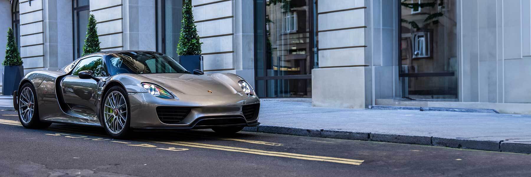 Banner image of a  Porsche 918 Spyder 918 featuring original Porsche wheels.