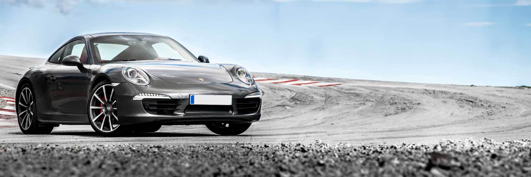 Banner image of a  Porsche 991 (911) 991 featuring original Porsche wheels.