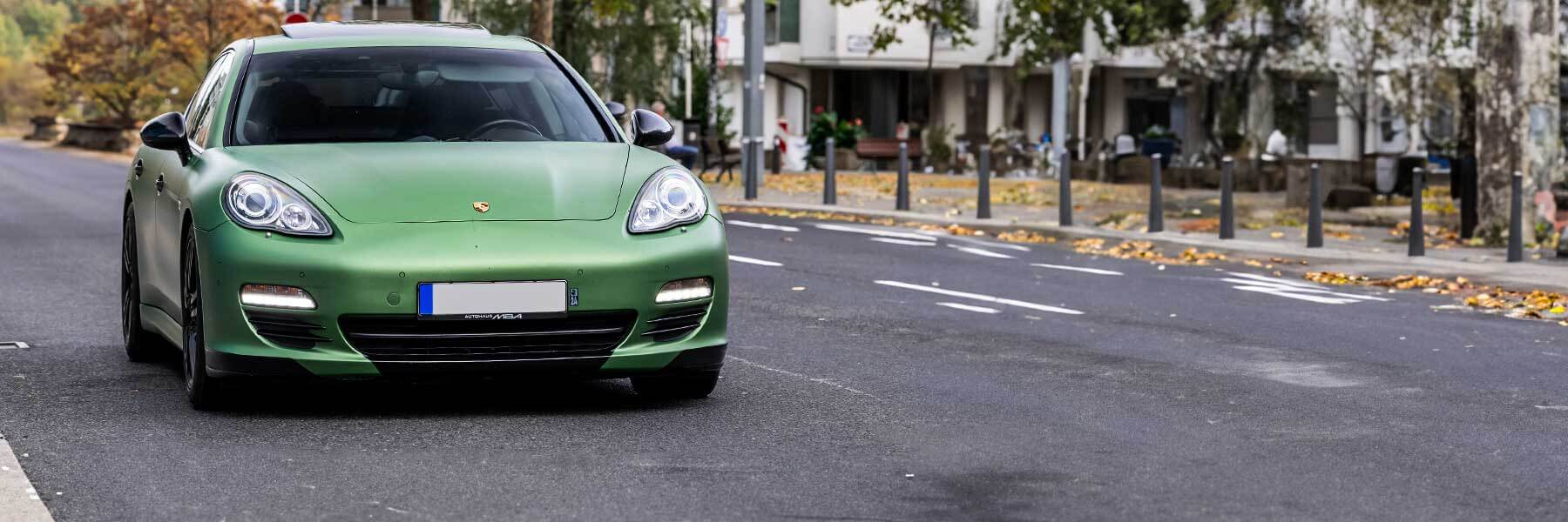 Banner image of a  Porsche Panamera G1 970 featuring original Porsche wheels.