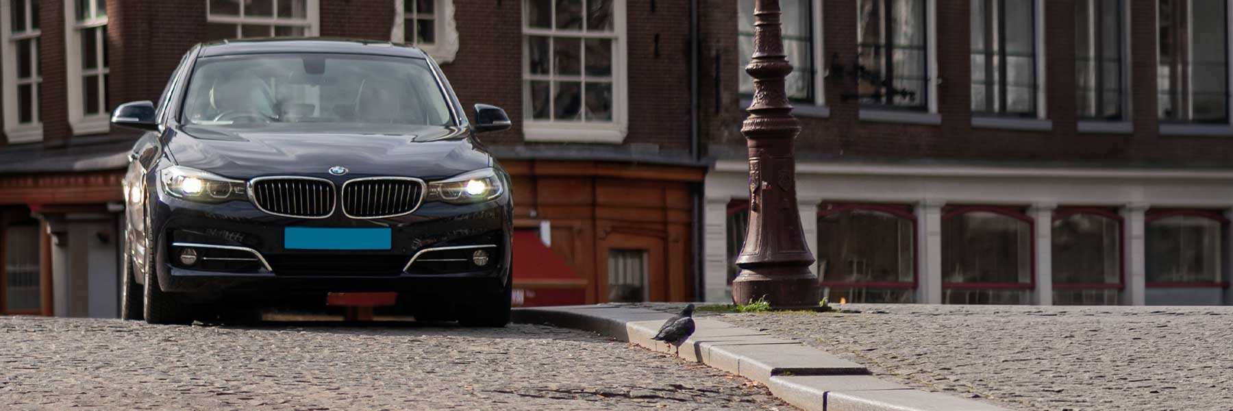 Banner image of a  BMW 5 Series F07 featuring original BMW wheels.