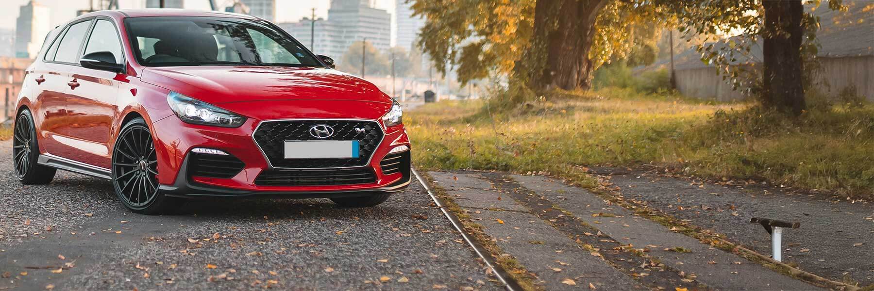 Banner image of a  Hyundai Sonata NF featuring original Hyundai wheels.