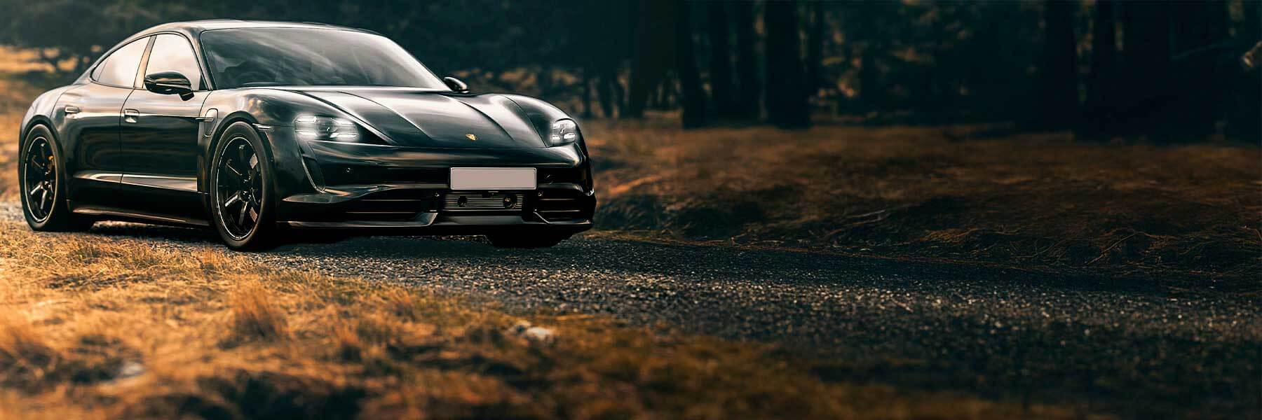 Porsche featured in banner showcasing its original alloy wheels.