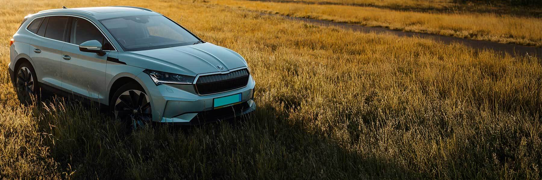 Banner image of a  Skoda Enyaq NY featuring original Skoda wheels.