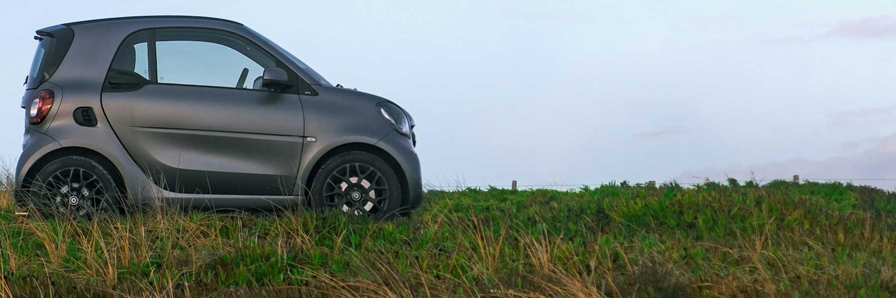 Featured banner showcasing the Smart #5 with original Smart wheels.