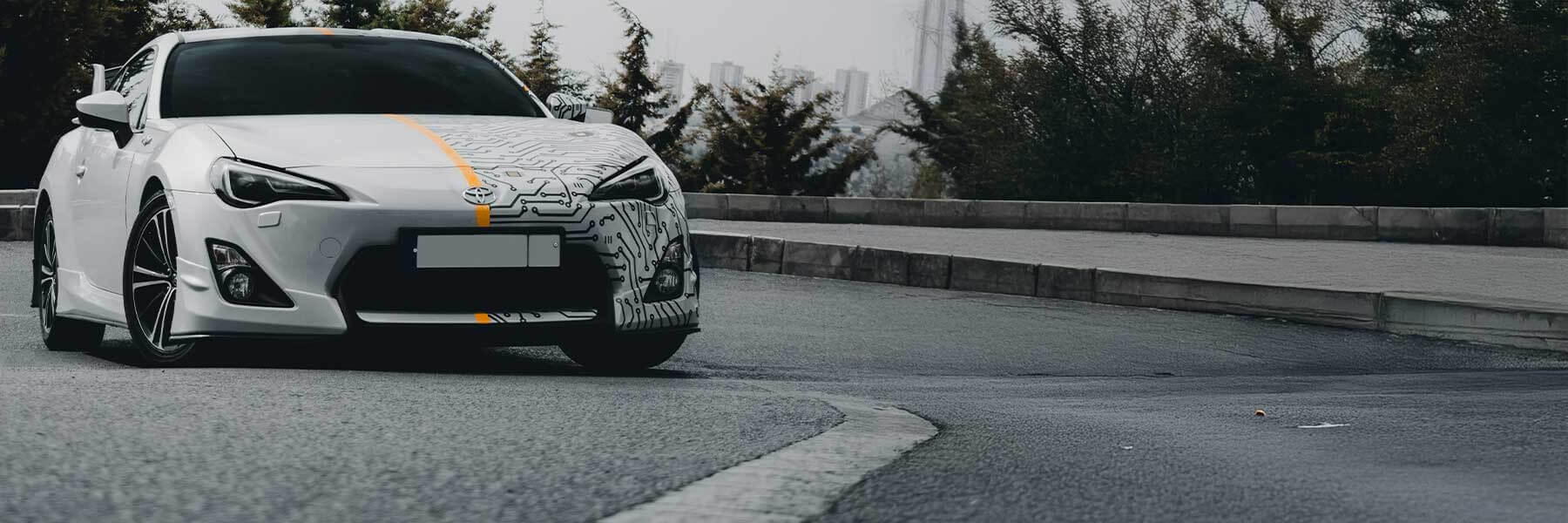 Banner image of a  Toyota Auris HE15U(a) featuring original Toyota wheels.
