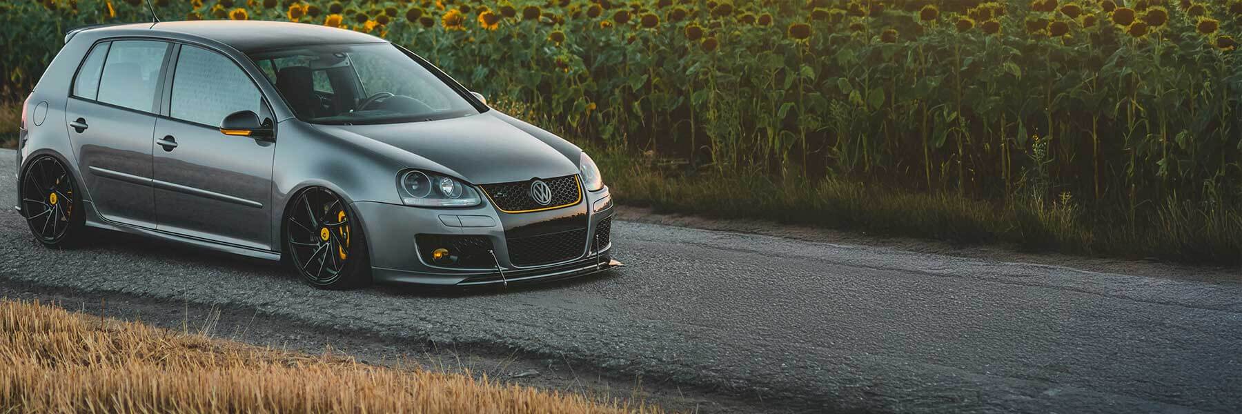 VW featured in banner showcasing its original alloy wheels.
