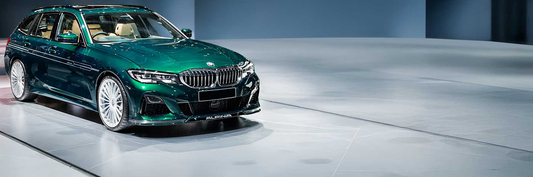 Banner image of a  Alpina B3 D3 E92 featuring original Alpina wheels.