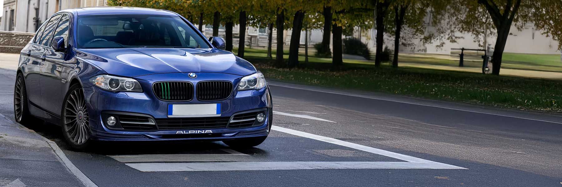 Banner image of a  Alpina B5 D5 G30 featuring original Alpina wheels.