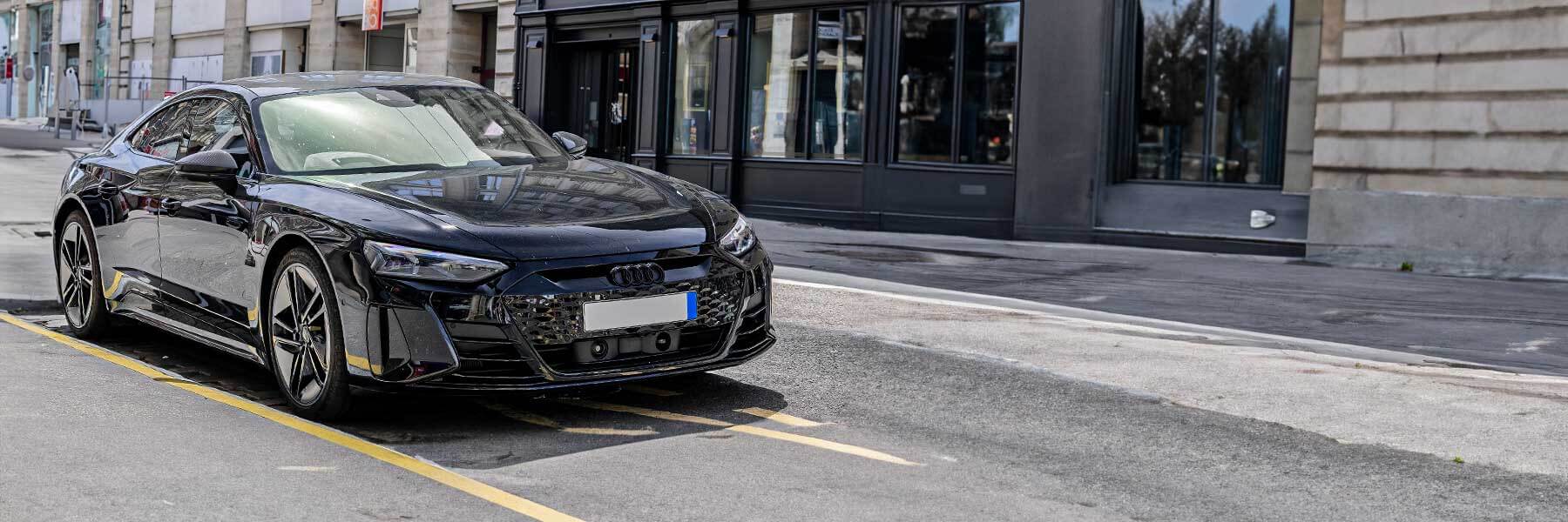 Featured banner showcasing the Audi RS E-Tron with original Audi wheels.