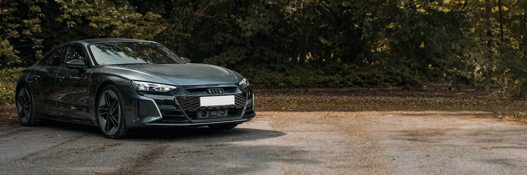 Featured banner showcasing the Audi e-tron GT with original Audi wheels.