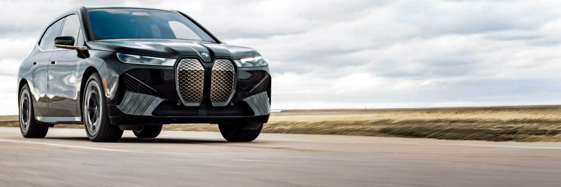 Featured banner showcasing the BMW iX with original BMW wheels.