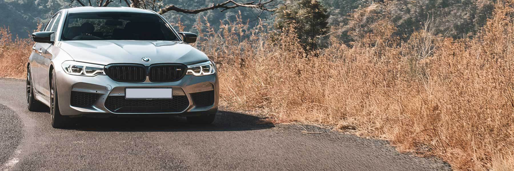 Featured banner showcasing the BMW M5 with original BMW wheels.