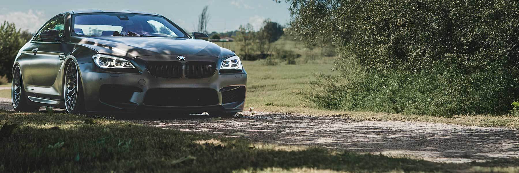 Featured banner showcasing the BMW M6 with original BMW wheels.