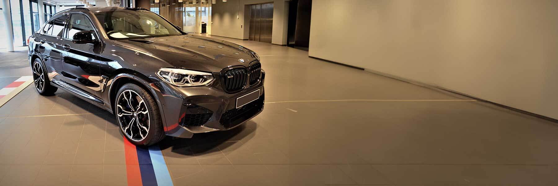 Featured banner showcasing the BMW X4 M with original BMW wheels.