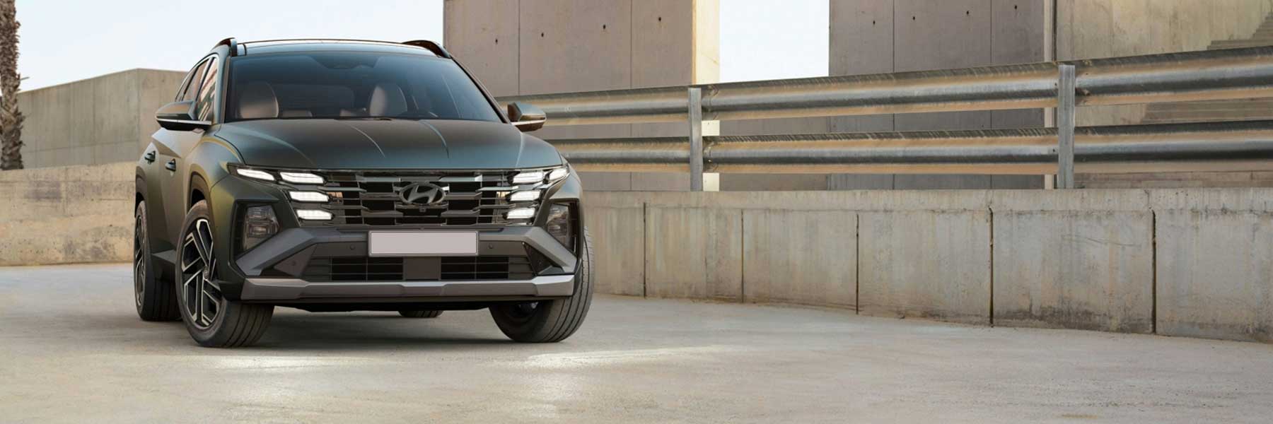 Banner image of a  Hyundai Tucson JM featuring original Hyundai wheels.