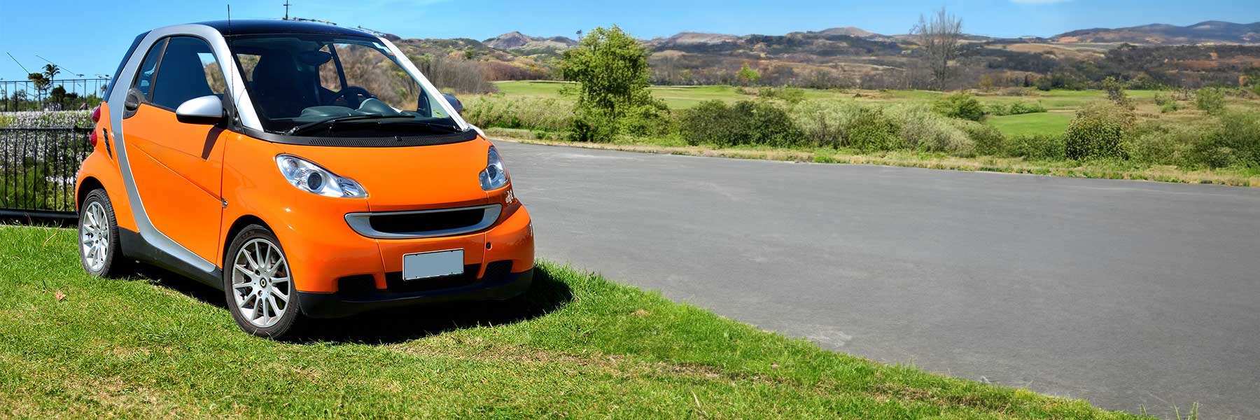 Featured banner showcasing the Smart ForTwo with original Smart wheels.