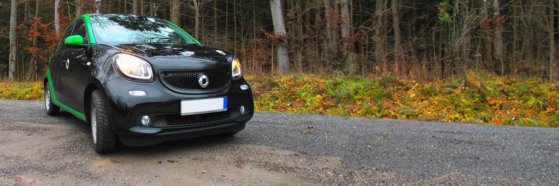 Featured banner showcasing the Smart ForFour with original Smart wheels.