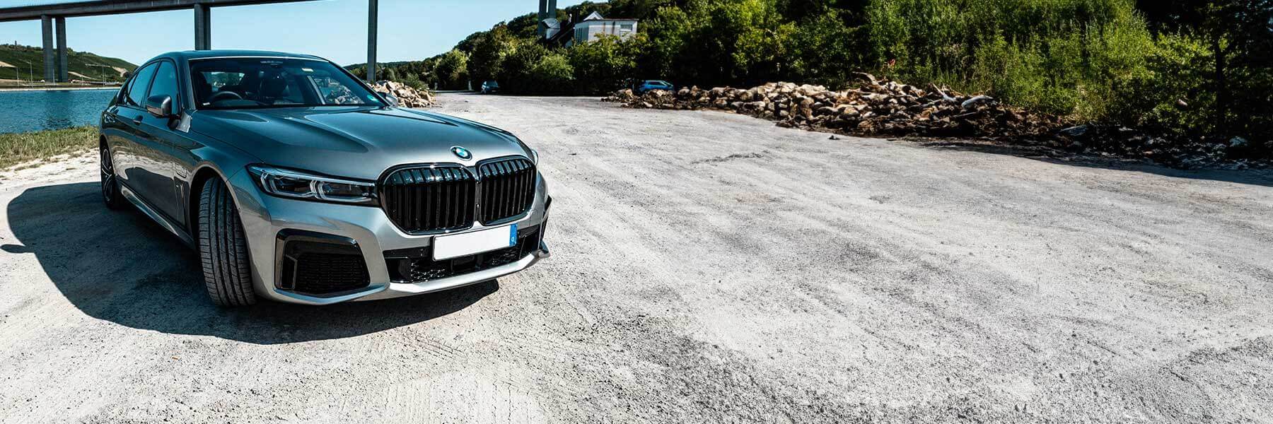 Banner image of a  BMW 7 Series G70 featuring original BMW wheels.