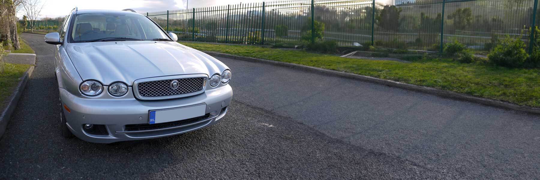 Featured banner showcasing the Jaguar X-Type with original Jaguar wheels.