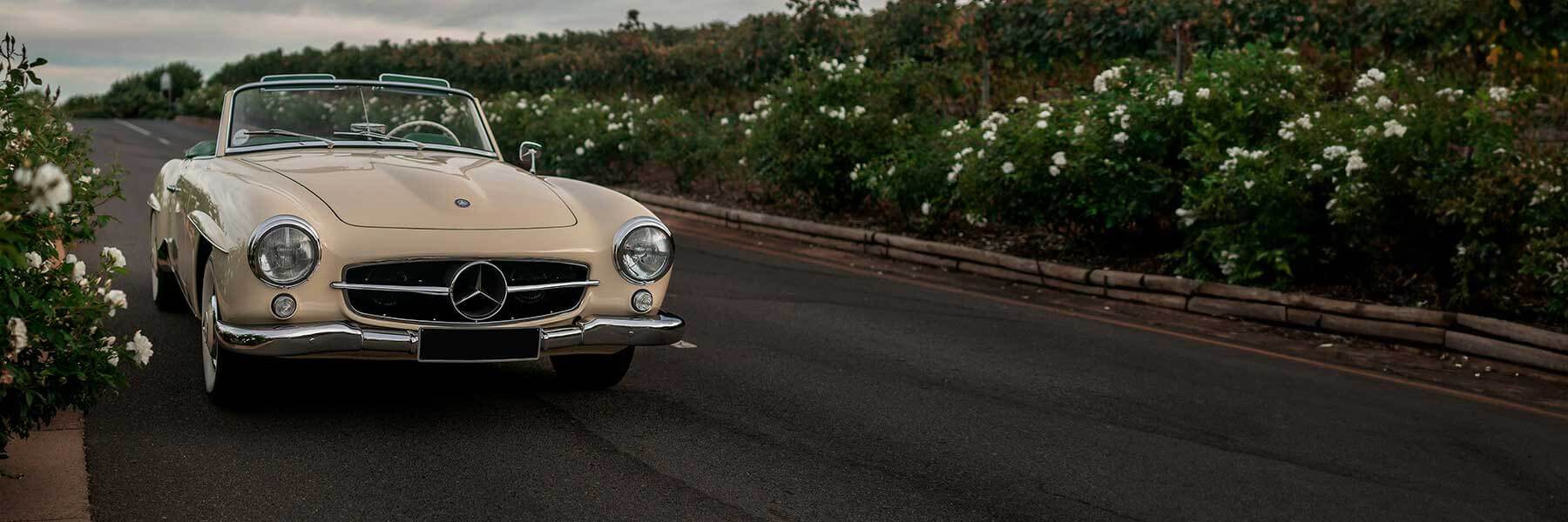Featured banner showcasing the Mercedes 190 with original Mercedes wheels.